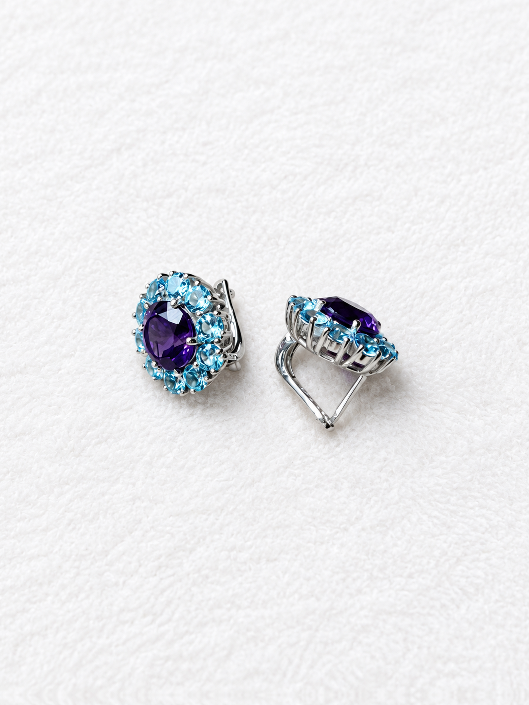 Blue gemstone silver earrings side view