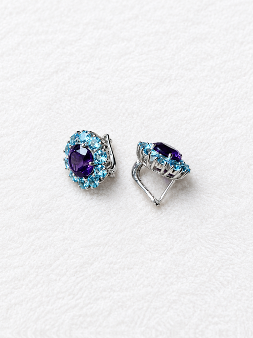Blue gemstone silver earrings side view