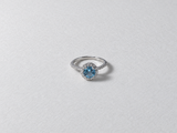 Blue Topaz Halo Silver Ring