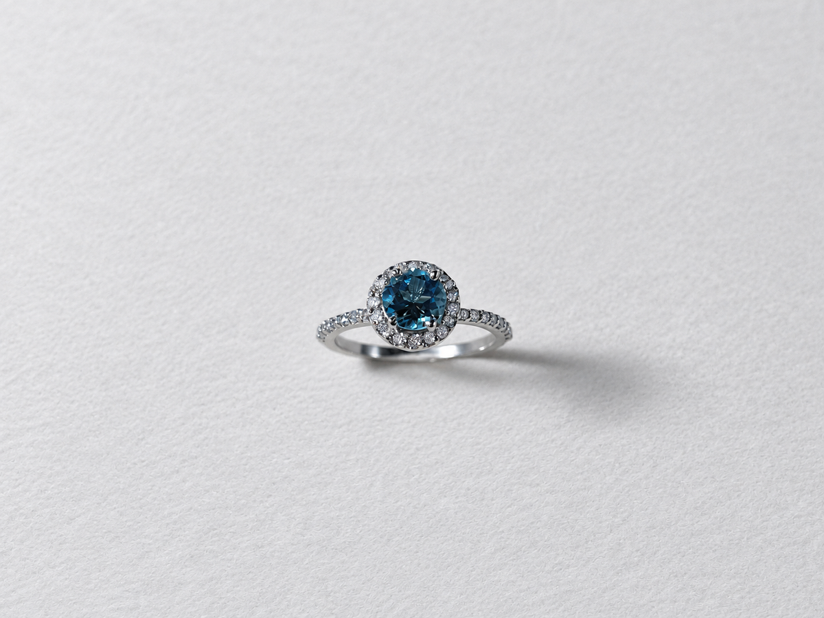 Blue topaz halo silver ring alternate front view