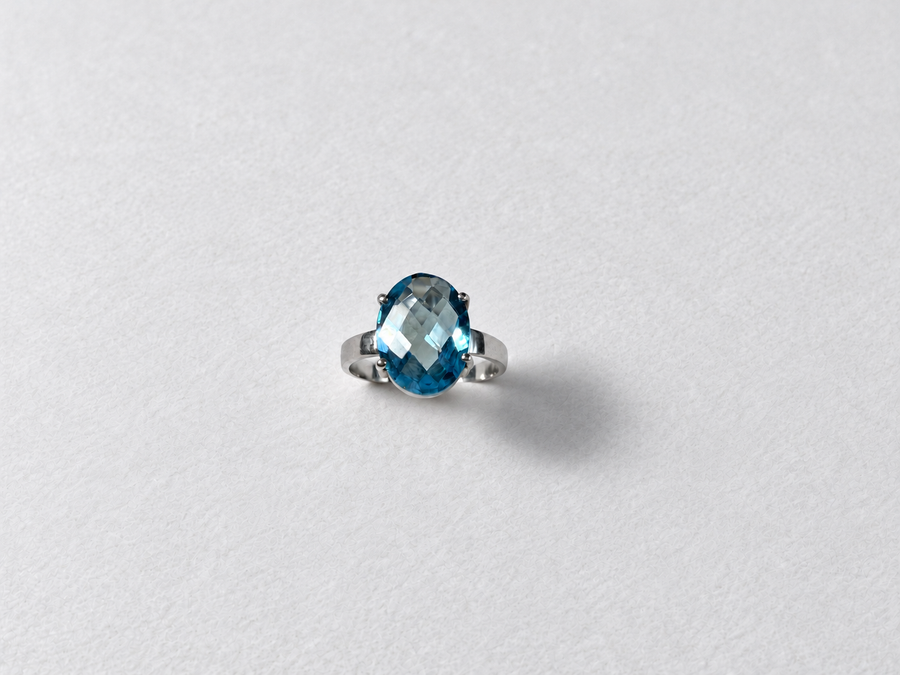 Blue Topaz Solitaire Silver Ring