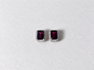 Burgundy emerald cut gemstone halo silver stud earrings view 1