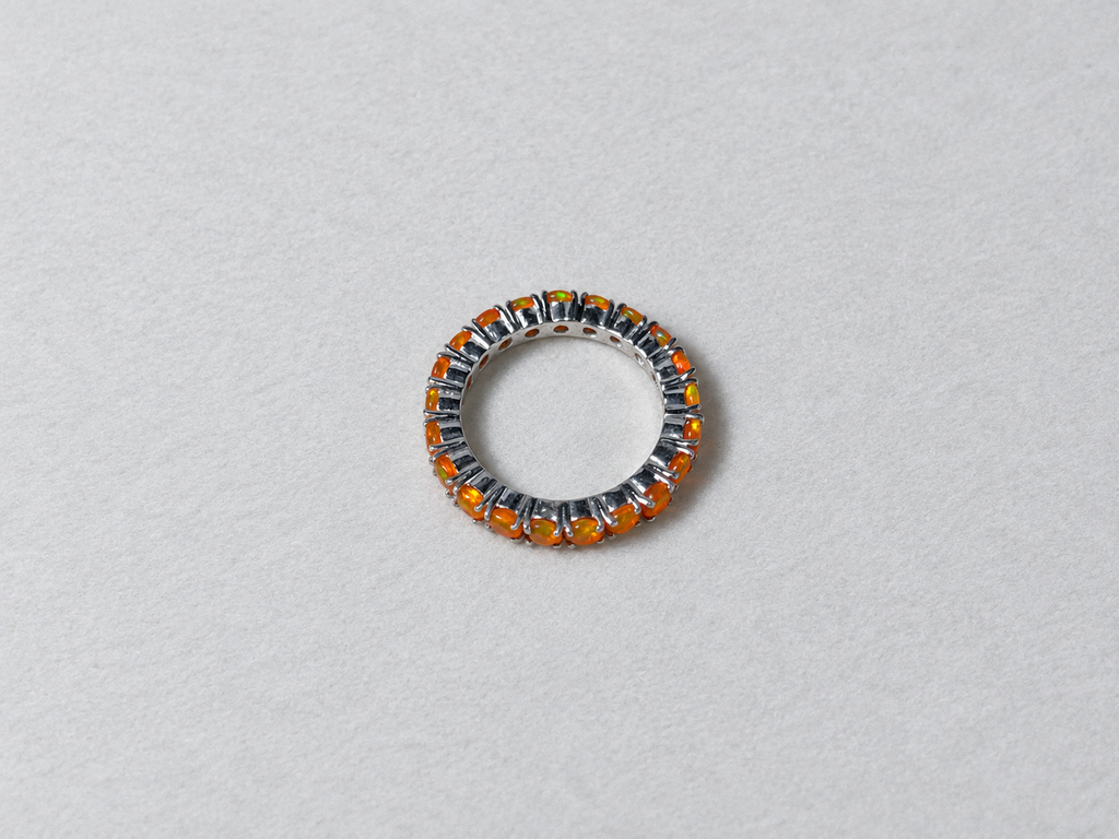 Fire opal eternity silver ring top view