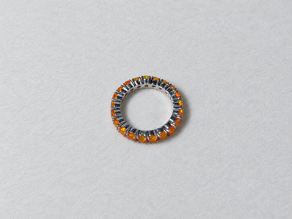 Fire opal eternity silver ring top view