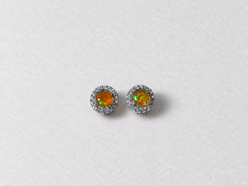 Fire opal halo silver stud earrings view 1