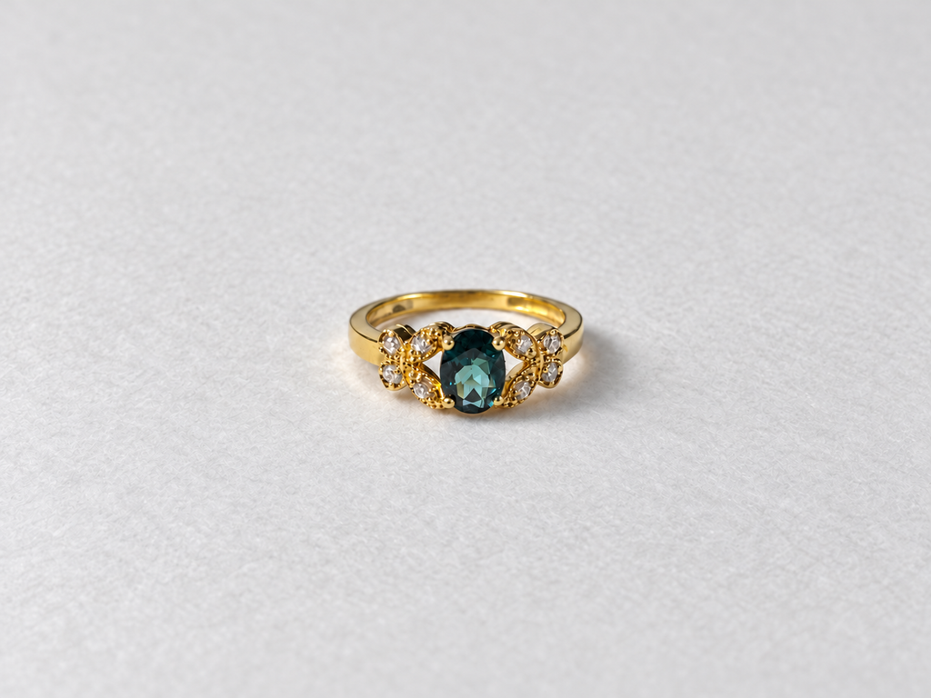 Green gemstone gold ring front view