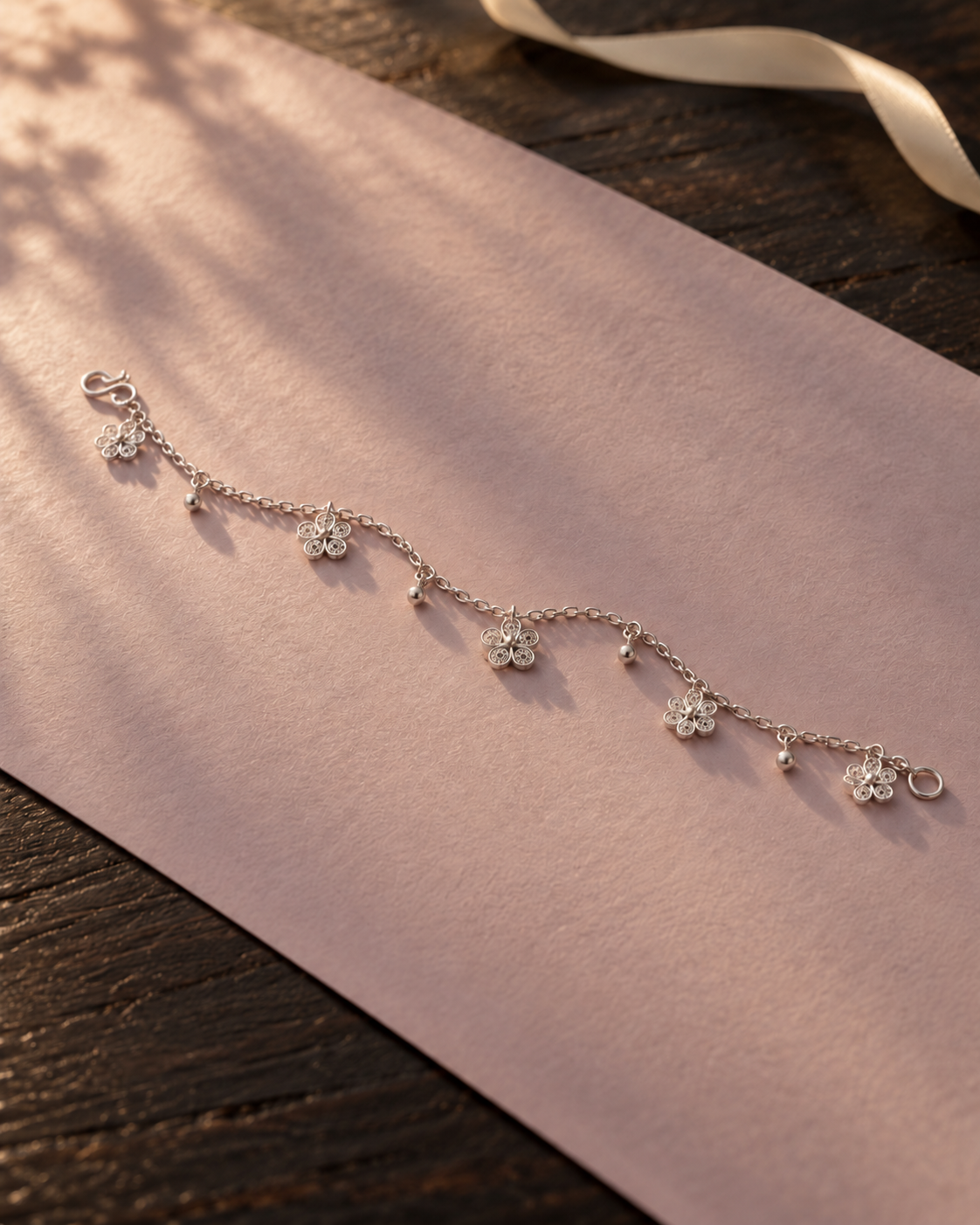 Handcrafted silver bracelet flat lay