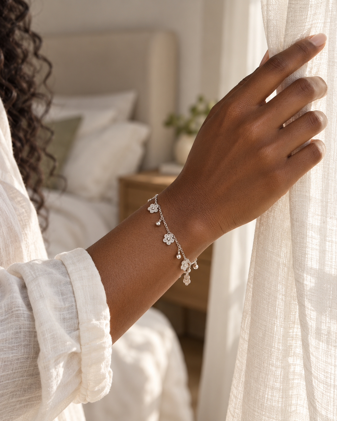 Handcrafted silver bracelet worn close-up