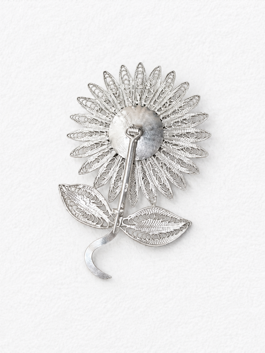Handcrafted silver floral brooch back