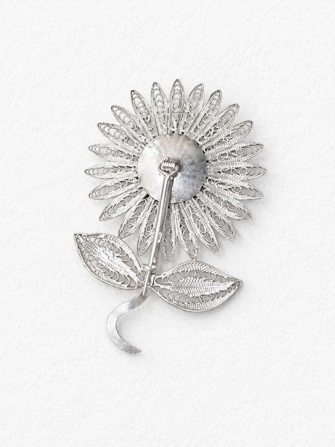 Handcrafted silver floral brooch back