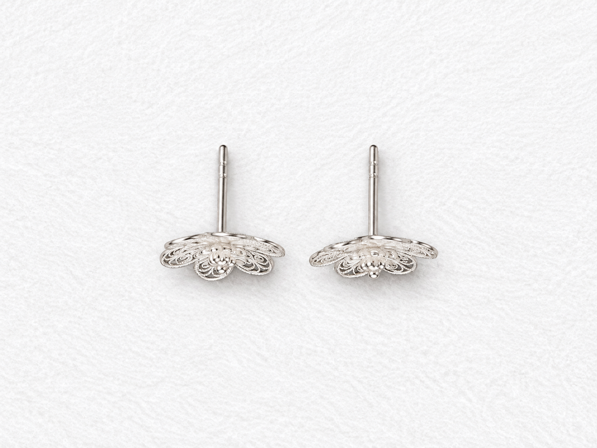 Handcrafted silver filigree floral earrings side view