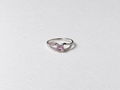 Pink center stone silver ring view 1