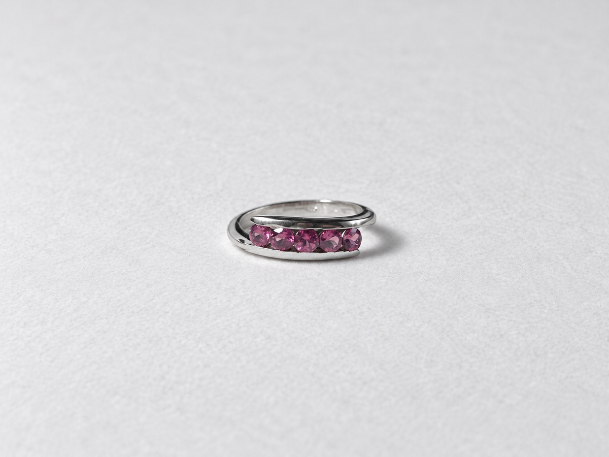 Pink gemstone silver band ring front view