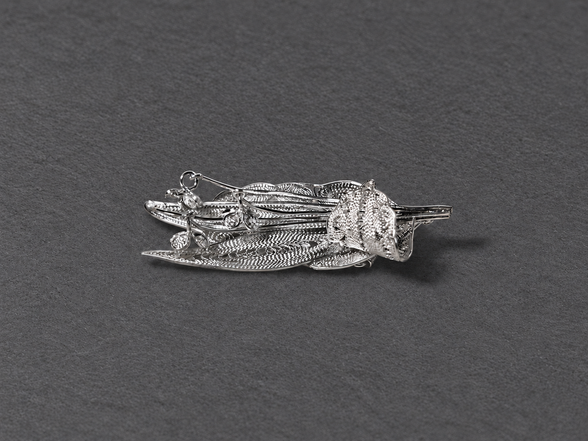 Silver botanical brooch