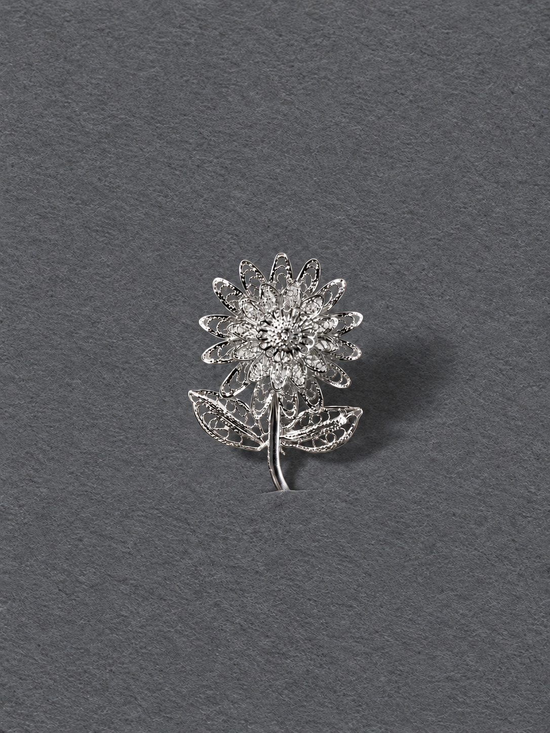 Silver floral brooch