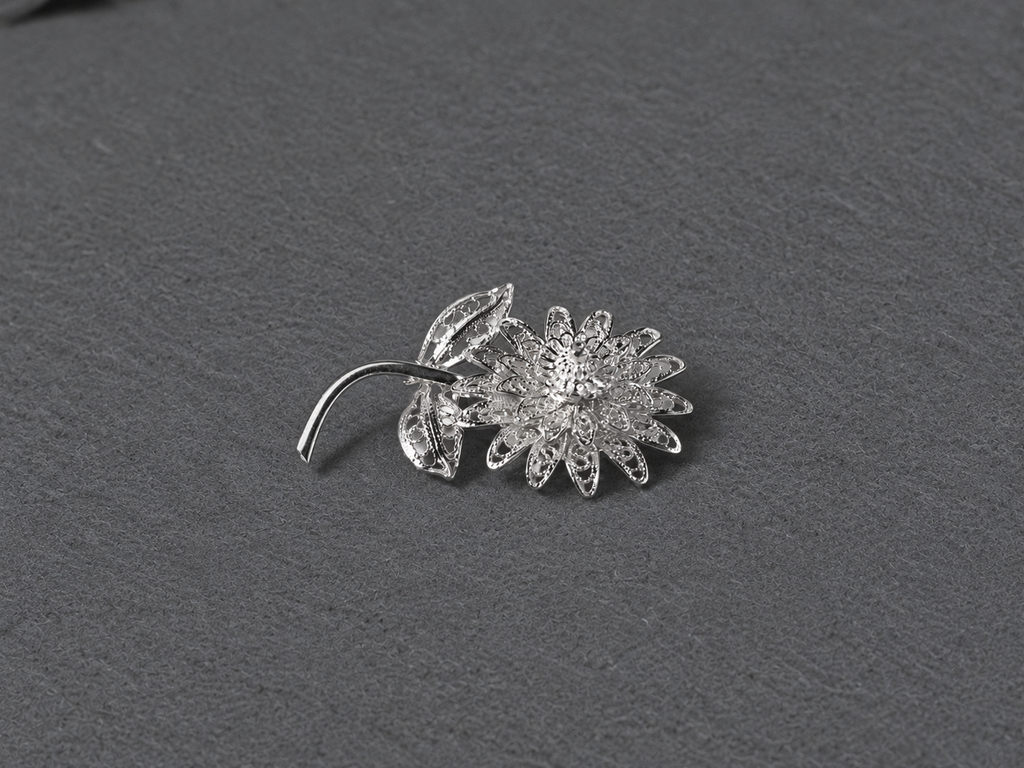 Silver floral brooch