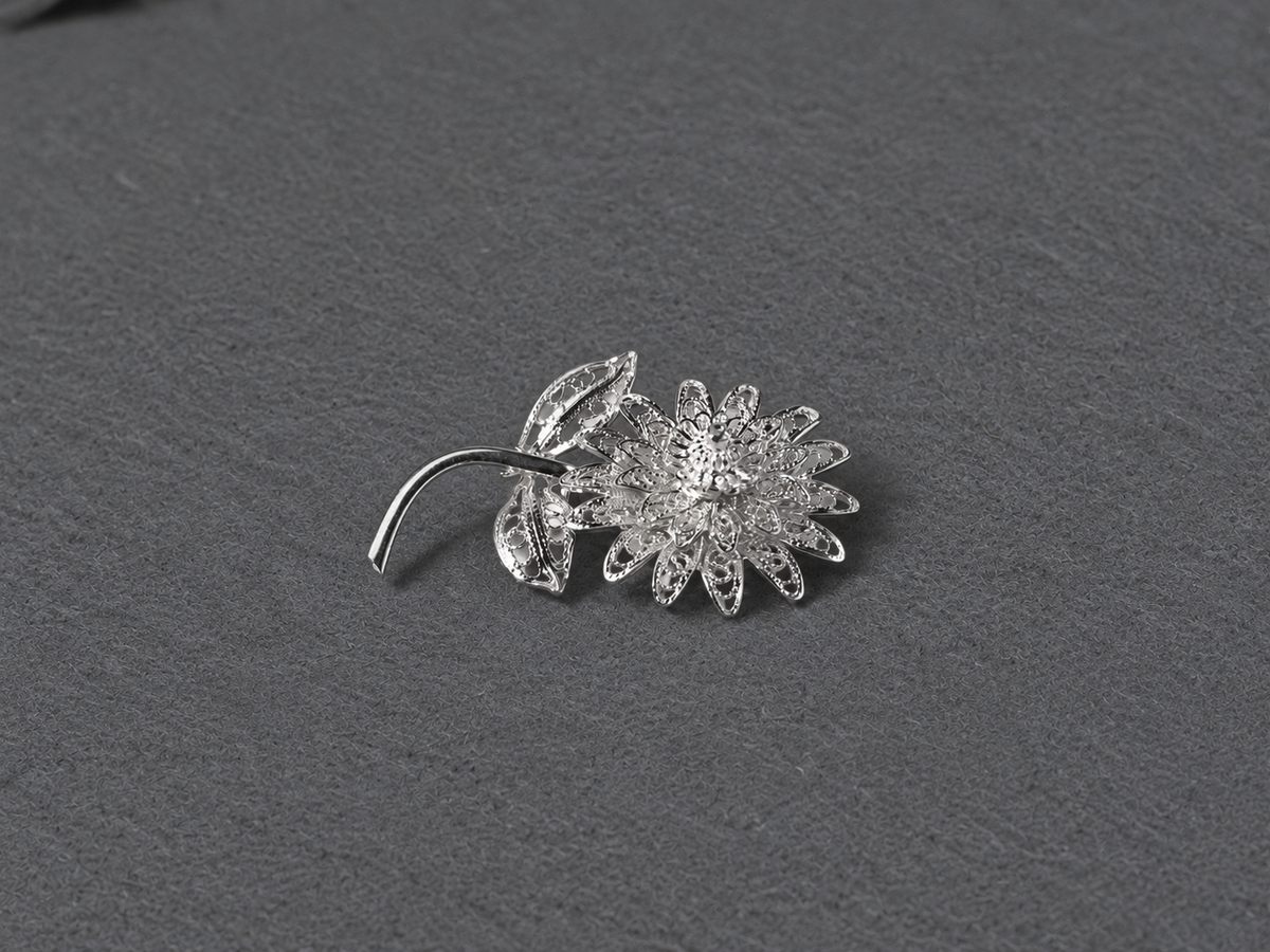 Silver floral brooch