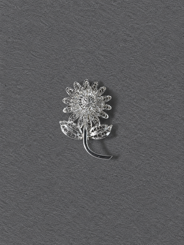 Silver floral brooch