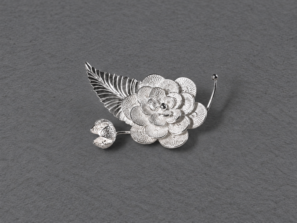 Silver floral leaf brooch front view