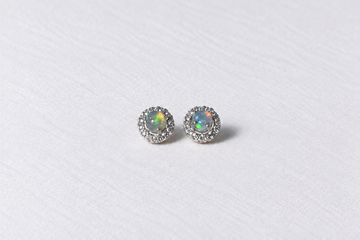 White opal halo silver stud earrings view 1