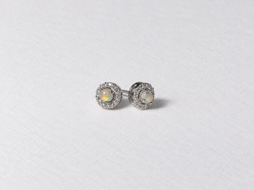 White opal halo silver stud earrings view 2
